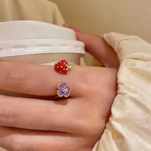 Dainty gold-plated open ring with strawberry and purple flower enamel charms for women