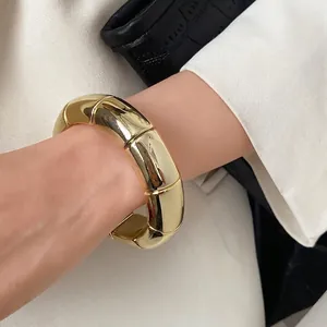 Luxury chunky gold segmented acrylic bracelet for women's minimalist fashion style