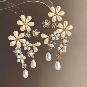 Elegant retro floral drop earrings with white pearls and sparkling rhinestones for women.