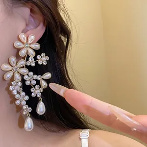 Exquisite vintage floral drop earrings with white pearls and sparkling crystals for women