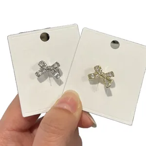 Elegant luxury crystal bow-shaped ear cuffs for non-pierced ears, gold and silver