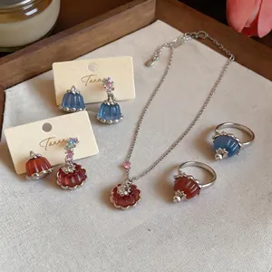 Elegant resin pudding jewelry set with zircon accents including necklace, rings and earrings