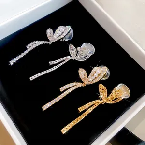 Elegant 18K gold plated butterfly ear clips with zircons and pearls for non-pierced ears