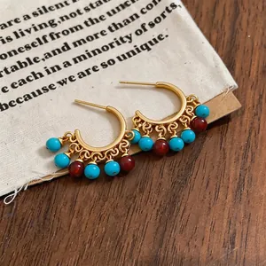 18k gold-plated C-shaped ethnic earrings with turquoise and red resin beads detail