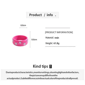 Detail view of pink resin bangle with silver star pattern including size and weight info