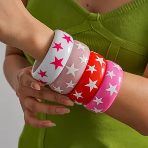 Detailed view of colorful resin dopamine style star pattern bangles set for women