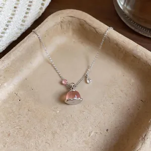 Dainty silver necklace with pink resin pudding pendant and sparkling zircon accents