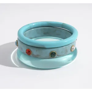 Three-piece retro resin bangle set with marble patterns and colorful rhinestones