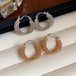 Elegant 18k gold plated woven hoop earrings in silver and gold