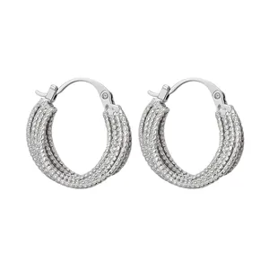 Elegant 18k gold plated hoop earrings with shimmering textured finish on white background