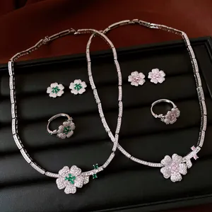 Luxury zircon flower jewelry set featuring necklace, ring and earrings in green and pink