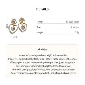 Detailed view of heart earrings with dimensions, weight, and material info.