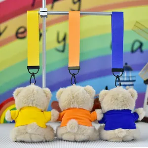 Set of three colorful teddy bear plush keychains with matching straps