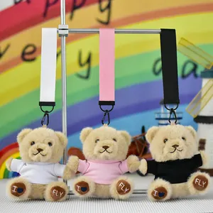 Three cute plush teddy bear keychains in white, pink, and black t-shirt variants
