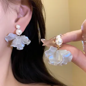 Elegant pearl and fabric petal drop earrings with shimmering light gray finish