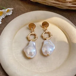 French Baroque irregular pearl pendant earrings in vintage gold finish
