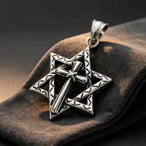 Detailed macro shot of a stainless steel hexagram pendant featuring a central cross.