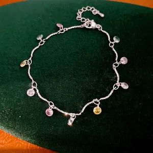 Elegant silver-colored chain necklace featuring vibrant multi-colored round zircon charms