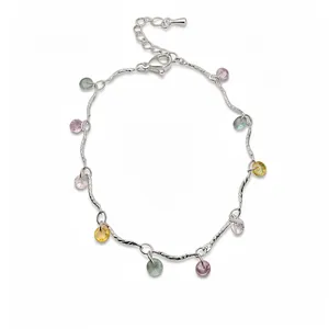 Silver chain bracelet with colorful round zircon charms in pink, green, and yellow