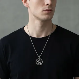 Detailed view of a vintage silver pentagram pendant on a stainless steel chain for men