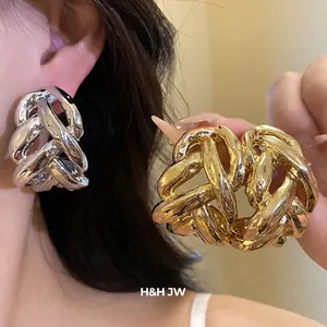 Bold chunky metal chain C-shaped stud earrings in polished gold and silver finishes