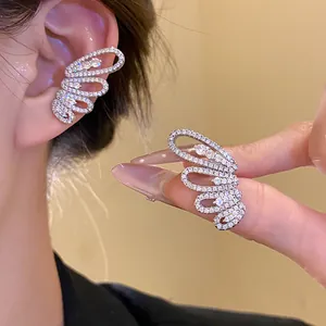 Close-up of pavé zircon butterfly wing ear cuff showing fine craftsmanship and sparkle