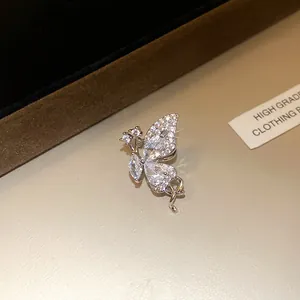 Detailed view of an exquisite zircon butterfly wing ear cuff with a high-end silver finish