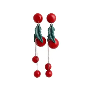 Creative red cherry drop earrings with green leaves and long silver chain tassels
