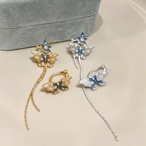 Élégantes boucles d'oreilles papillon et fleur avec pampilles en émail et zircon