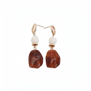 Vintage irregular brown resin geometric drop earrings featuring white bead accents