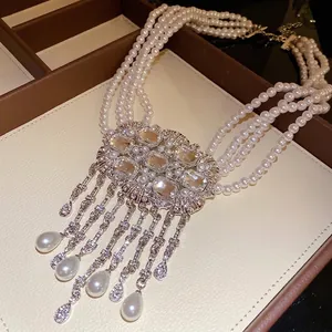 Elegant multi-layer white pearl necklace with luxury rhinestone waterdrop tassels