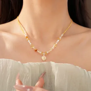 Handmade yellow beaded necklace featuring a clear crystal flower pendant for women
