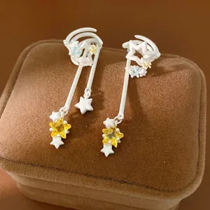 Silver star ear clips with sparkling yellow zircon and layered tassels for non-pierced ears