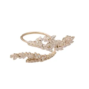 Elegant rose gold three-layer leaf crossover open bangle with sparkling cubic zirconia stones