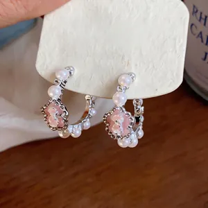 Silver needle C-shaped hoop earrings with pearls and pink flower design