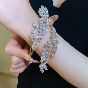 Close-up of zircon leaf cuff bracelet showing sparkling marquise-cut stones.