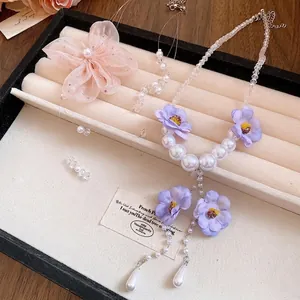 Elegant pearl beaded necklace with purple chiffon flowers and matching pink floral hair clip set
