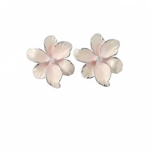 Elegant pink enamel flower stud earrings with zircon center and silver needle backings