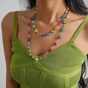 Detail shot of vibrant dopamine style layered heart necklace with rhinestones
