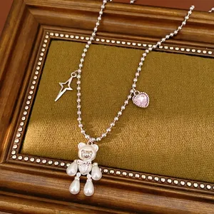 Elegant silver ball chain necklace featuring a cute bear pearl pendant with star and heart charms