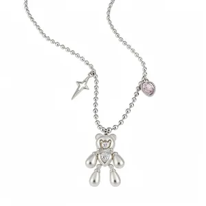Elegant zircon star and pearl teddy bear necklace on a stylish silver beaded chain design