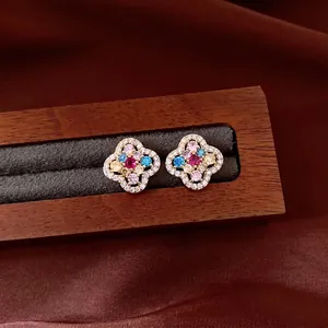Luxurious 14k gold plated flower stud earrings featuring vibrant colorful zircon stones