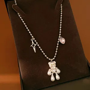 Elegant pearl bear pendant necklace with zircon star and pink heart charms for women