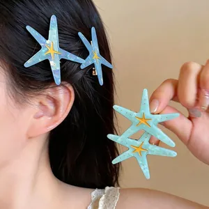 Pinces à cheveux étoiles de mer élégantes en résine bleu et menthe pour les vacances