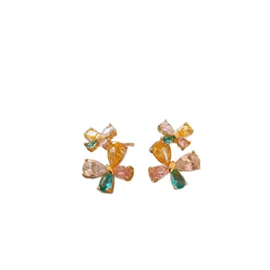 Elegant gold-tone butterfly stud earrings with colorful zircon teardrop stones