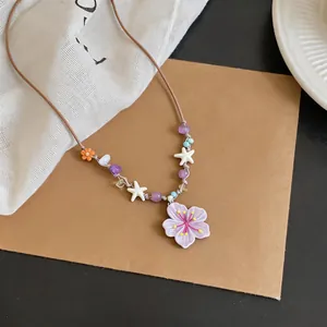 Adorable dopamine-style purple flower pendant necklace with star and bead details