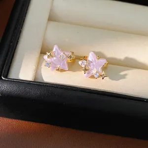 Eleganti orecchini a cerchio a forma di stella rosa con zirconi brillanti