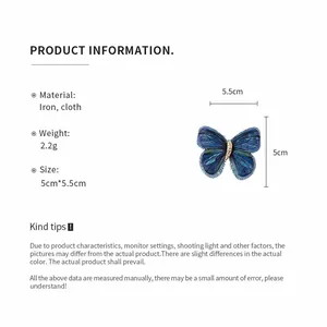 Size detail for the blue knitted butterfly hair clip with 5.5cm x 5cm measurements.