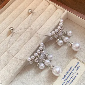 Elegant French vintage silver hoop earrings with cascading white pearl tassels for women