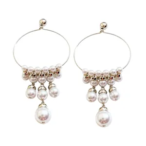Elegant French retro hoop earrings featuring white pearl tassels and hypoallergenic silver needles